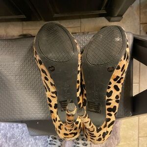Gently used Leopard print heels.